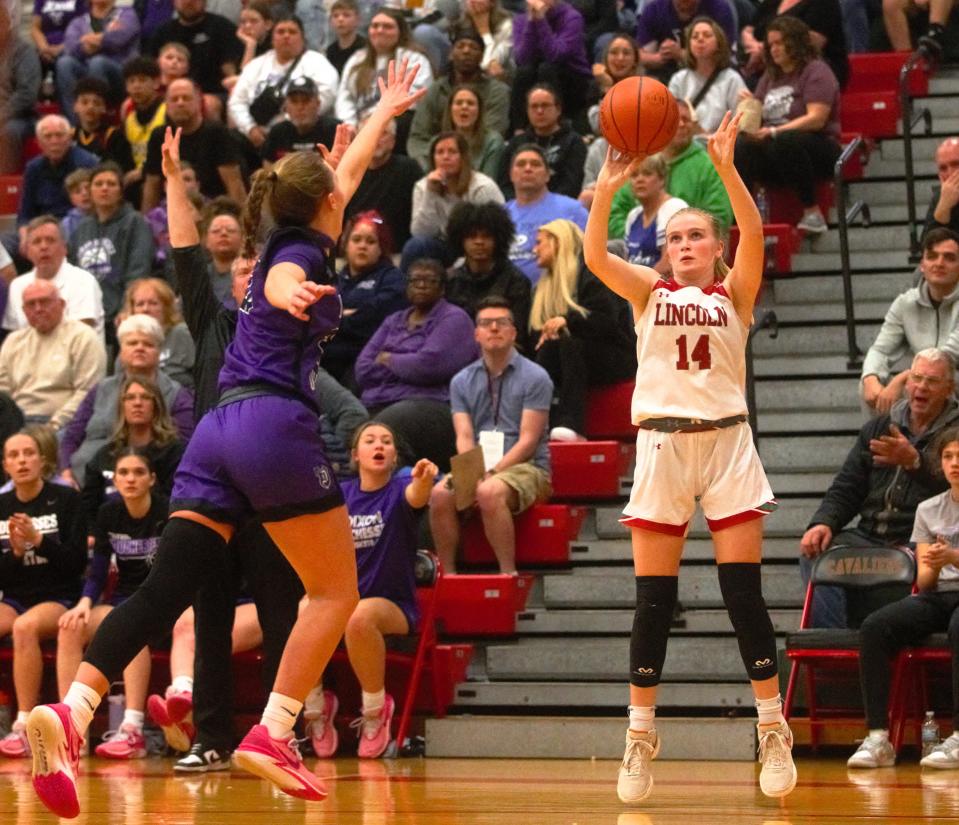 Lincoln's Jenna Bowman attempts a 3-pointer against Dixon in the Class 2A LaSalle-Peru Supersectional on Monday, Feb. 26, 2024.