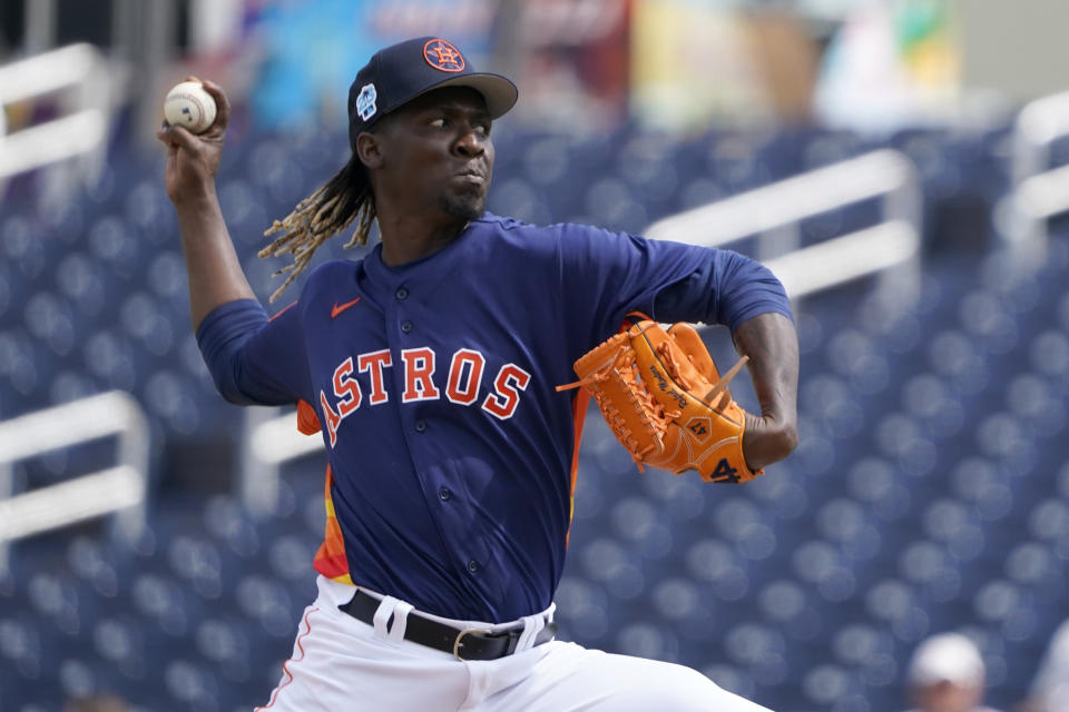 Houston Astros pitcher Rafael Montero throws during the second inning of a spring training baseball game against the Atlanta Braves Friday, March 3, 2023, in West Palm Beach, Fla. (AP Photo/Jeff Roberson)