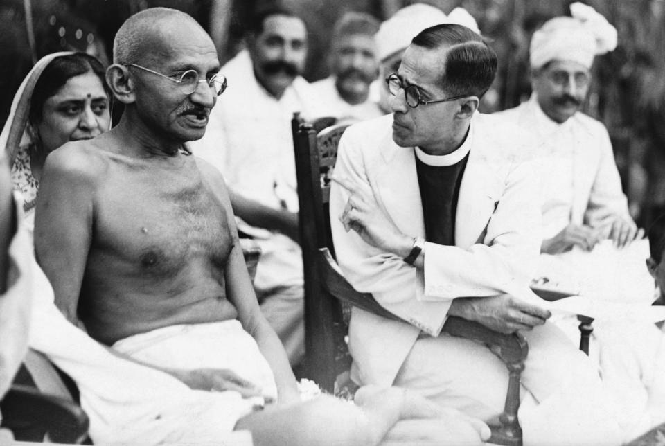 Mahatma Gandhi talks to Reverend A. M. Dalaya, the Principal of King Edward's College in Peshawar. Gandhi has come to talk to the students at the college. (Photo by © Hulton-Deutsch Collection/CORBIS/Corbis via Getty Images)