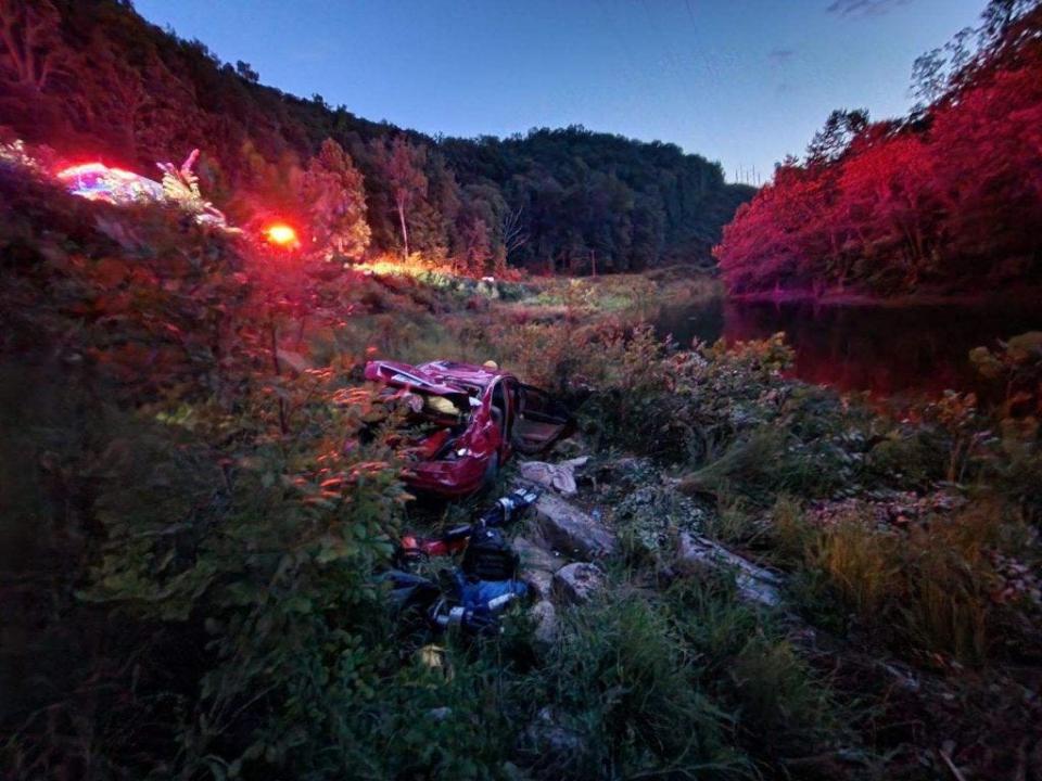 A 19-year-old woman was trapped inside her vehicle after it plunged off a cliff and rolled down a 70-foot embankment above the Cacapon River near the Maryland, West Virginia border.
