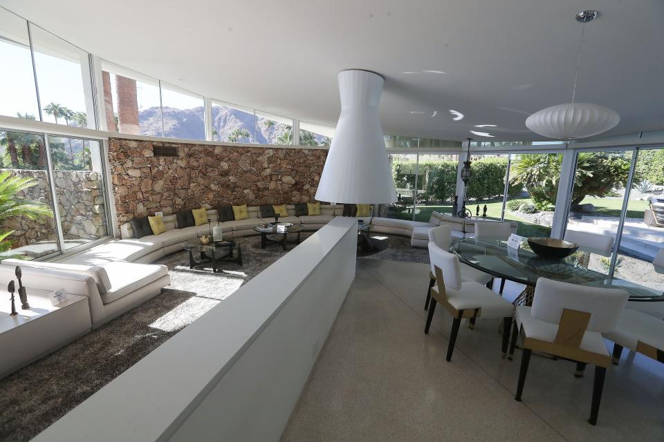 The living room and the dining room in the House of Tomorrow during Modernism Week in Palm Springs, Calif., Oct. 14, 2022. 