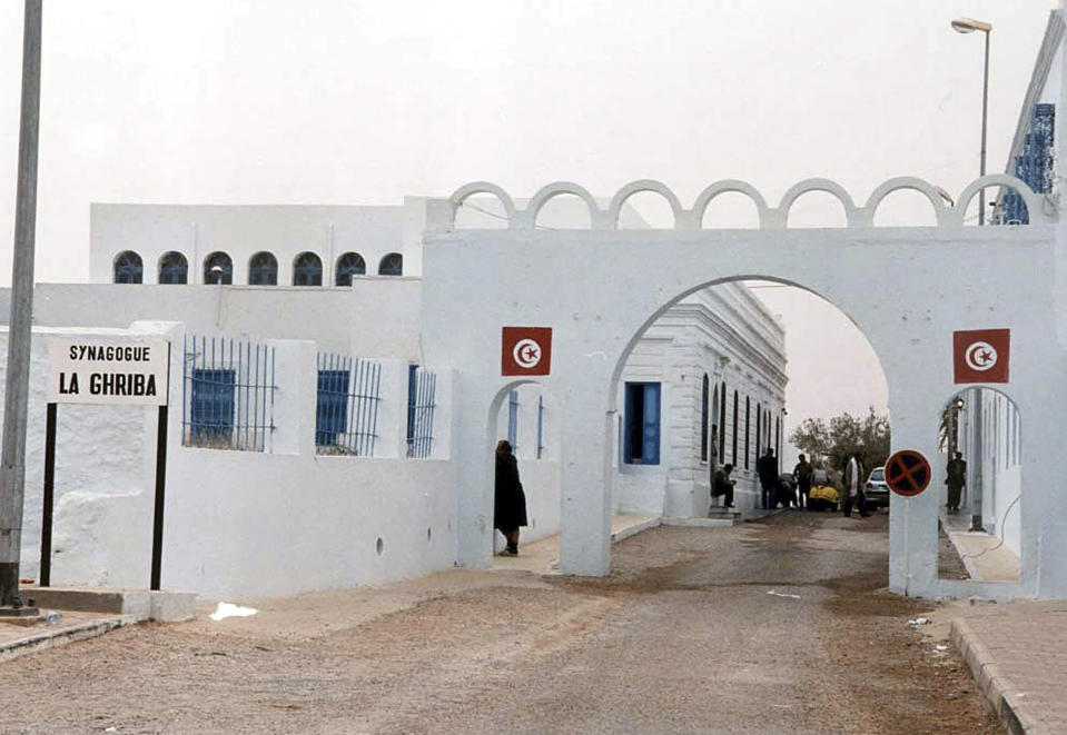 FILE - Ghriba synagogue is seen in Djerba, Tunisia, April 12, 2002. The Tunisian Interior Ministry says a naval guard shot and killed a colleague and two civilians Tuesday, May 9, 2023, near the synagogue during an annual Jewish pilgrimage. (AP Photo/Hassene Dridi, File)