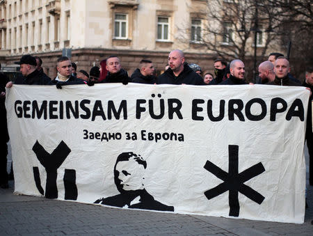 Members and supporters of several nationalist organizations take part in a march in commemoration of Bulgarian General Hristo Lukov in Sofia, Bulgaria, February 17, 2018. The banner reads "Together for Europe". REUTERS/Dimitar Kyosemarliev