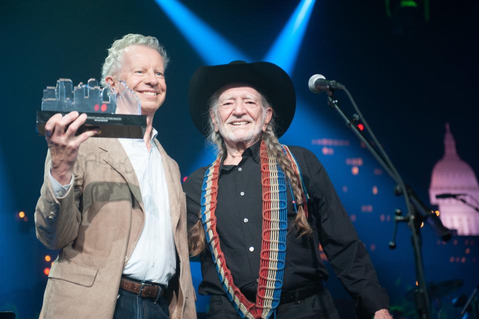 Terry Lickona inducts Willie Nelson into the Austin City Limits Hall of Fame in 2014. Nelson has appeared on the show 18 times, more than any other artist.