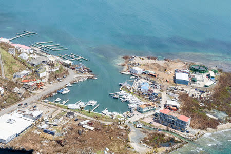 Buildings and boats damaged by hurricane Irma are seen from the air on the British Virgin Islands, September 10, 2017. Cpl Timothy Jones Ministry of Defense Handout via REUTERS