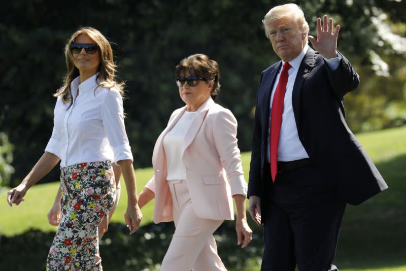 Former President Donald Trump (R) walks with former first lady Melania Trump (L) and Melania's mother, Amalija Knavs, on the South Lawn of the White House on June 29, 2018. Knavs has died at age 78. File Photo by Yuri Gripas/UPI