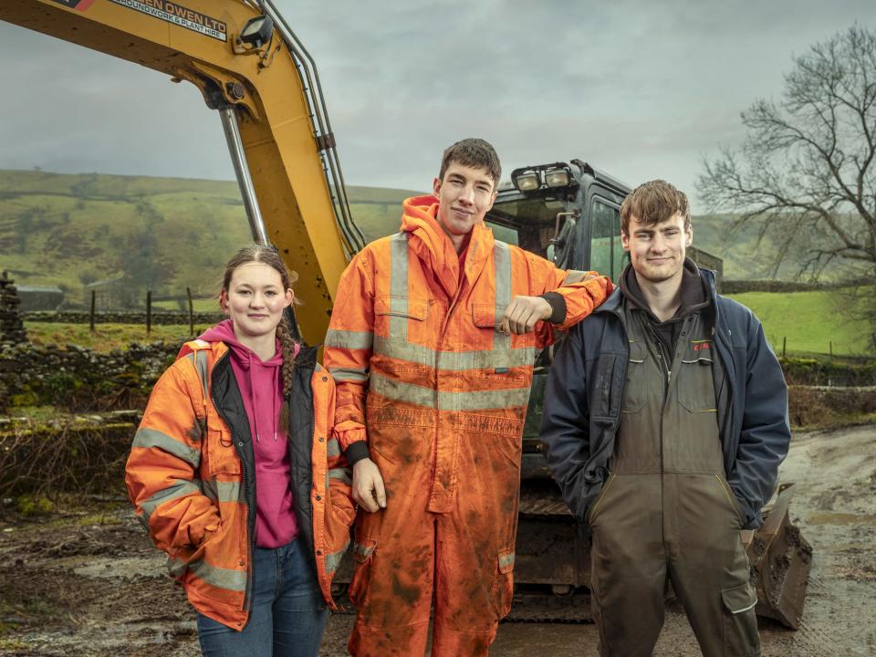 Sarah Dow, Reuben Owen and their friend Tommy on a farm