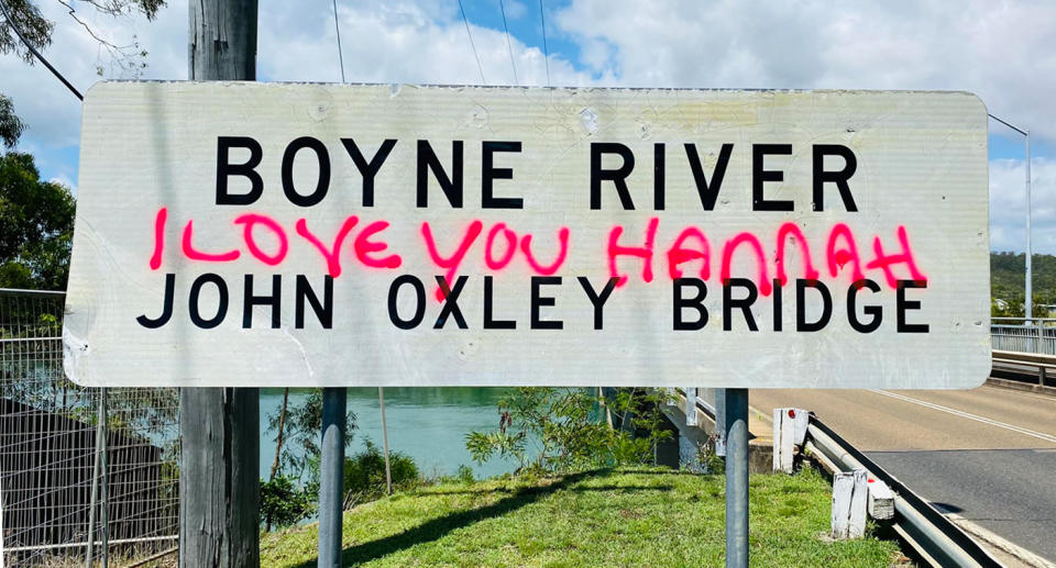 A lovelorn graffiti artist wrote 'I love you Hannah' on a road sign. 