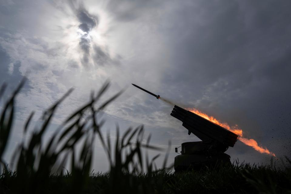 A Ukrainian MSLR BM-21 &quot;Grad&quot; fires towards Russian positions, at the frontline in Donetsk region, Ukraine, on Saturday, April 8, 2023.