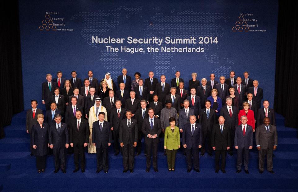 President Barack Obama poses during the family photo at the Nuclear Security Summit, Tuesday, March, 25, 2014, in The Hague, The Netherlands. (AP Photo/Doug Mills, Pool)