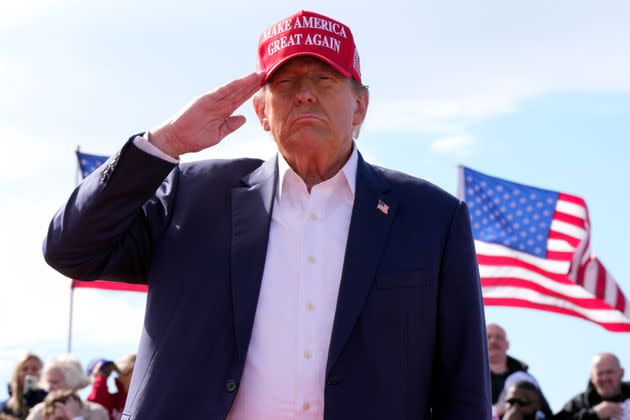 Former President Donald Trump salutes at a 2024 campaign rally March 16, 2024, in Vandalia, Ohio.