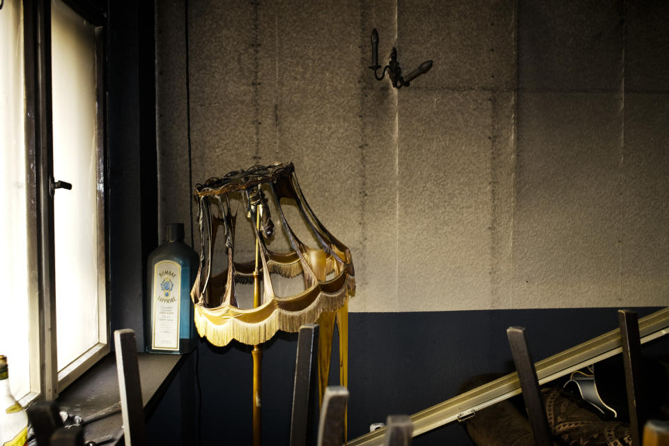 The remains of a lamp stand in the burned out Jewish-run bar 'Morgen wird Besser' (Morning will be better) in Berlin, Germany, Friday, Aug. 21, 2020. The Jewish-run bar was destroyed in an arson attack on Friday, Aug. 14, 2020. The Department for Research and Information on Anti-Semitism Berlin, or RIAS documented 410 incidents in Berlin, more than two a day, in the first half of 2020, including physical attacks, property damage, threats, harmful behavior and anti-Semitic propaganda. (AP Photo/Markus Schreiber)