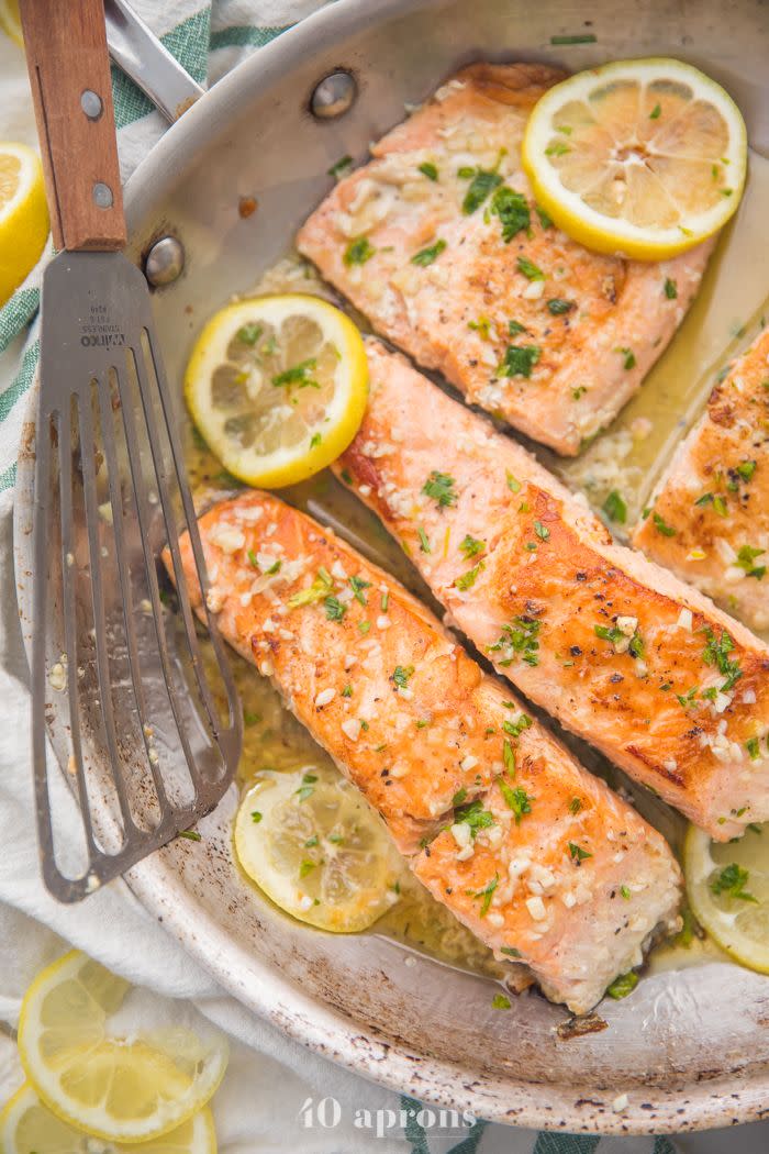 <p>Not everyone eats meat, so a turkey won’t cut it for vegans and pesctetarians. Fortunately, this lemon garlic salmon from <a href="https://40aprons.com/lemon-garlic-salmon-whole30/" rel="nofollow noopener" target="_blank" data-ylk="slk:40 Aprons;elm:context_link;itc:0;sec:content-canvas" class="link ">40 Aprons</a> is an excellent option for those looking to have more fish in the diet. It's ready in 25 minutes, too, which is super fast!</p>