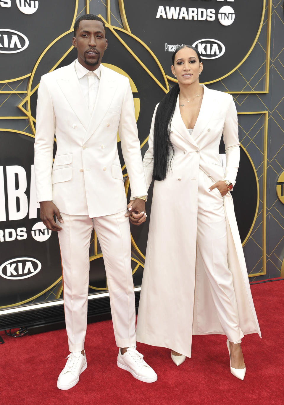 NBA player Kentavious Caldwell-Pope, of the Los Angeles Lakers, left, and McKenzie Caldwell-Pope arrive at the NBA Awards on Monday, June 24, 2019, at the Barker Hangar in Santa Monica, Calif. (Photo by Richard Shotwell/Invision/AP)