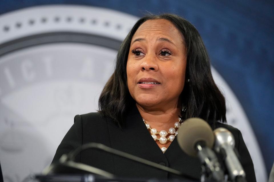 Fulton County District Attorney Fani Willis speaks in the Fulton County Government Center during a news conference, on Monday, Aug. 14, 2023, in Atlanta. Donald Trump and several allies have been indicted in Georgia over efforts to overturn his 2020 election loss in the state.