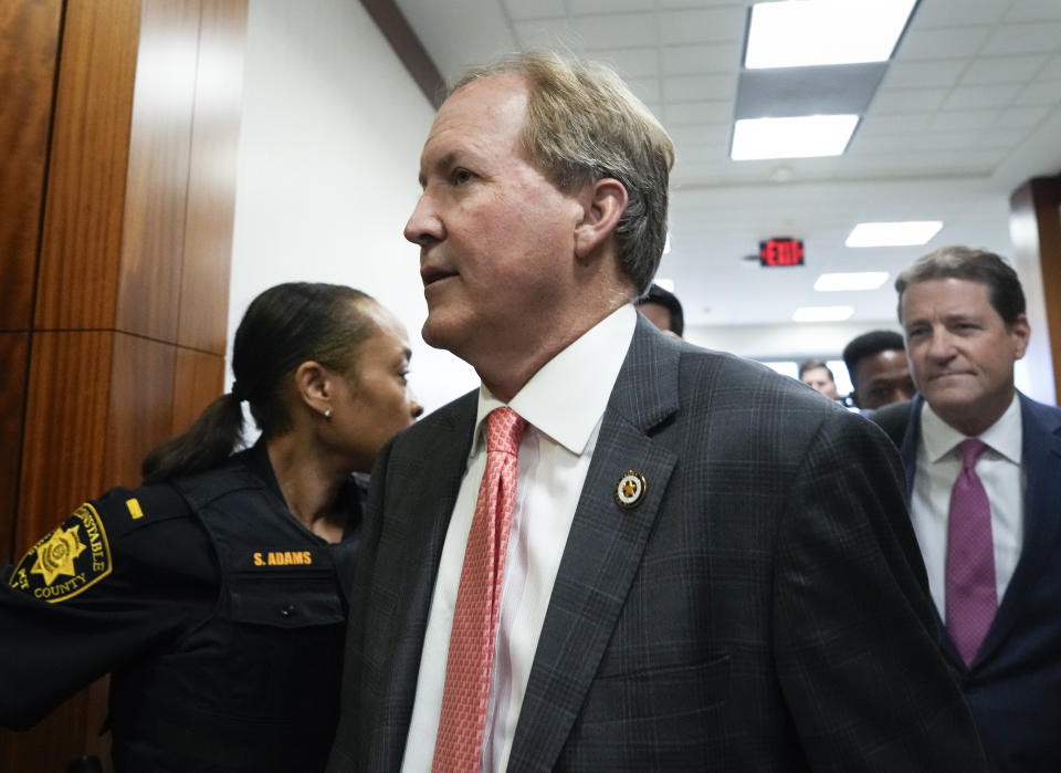 Texas Attorney General Ken Paxton appears at a pretrial hearing in his securities fraud case before state District Judge Andrea Beall, Tuesday, March 26, 2024 at Harris County Criminal Courts at Law in Houston. Prosecutors announced an agreement with Paxton that would ultimately dismiss securities fraud charges he has been facing for nearly a decade. (Yi-Chin Lee/Houston Chronicle via AP)