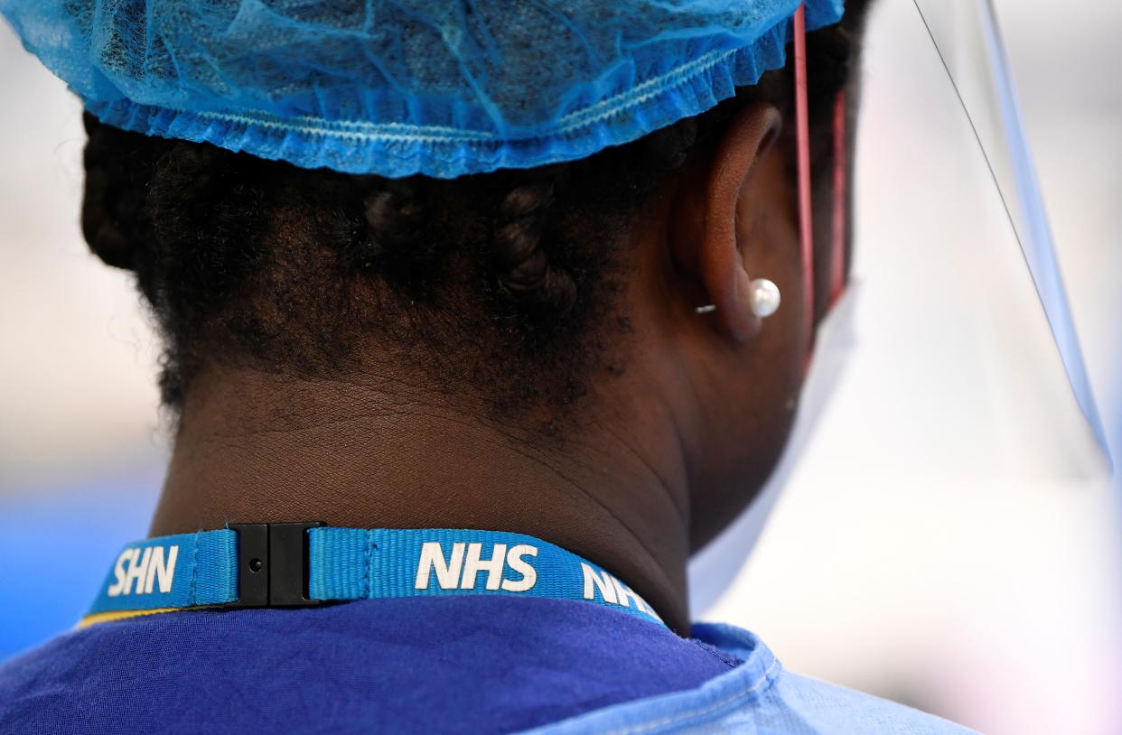 Detail is seen on a lanyard of a nurse on a COVID-19 ward at Milton Keynes University Hospital, amid the spread of the coronavirus disease (COVID-19) pandemic, Milton Keynes, Britain, January 20, 2021. Picture taken January 20, 2021. REUTERS/Toby Melville