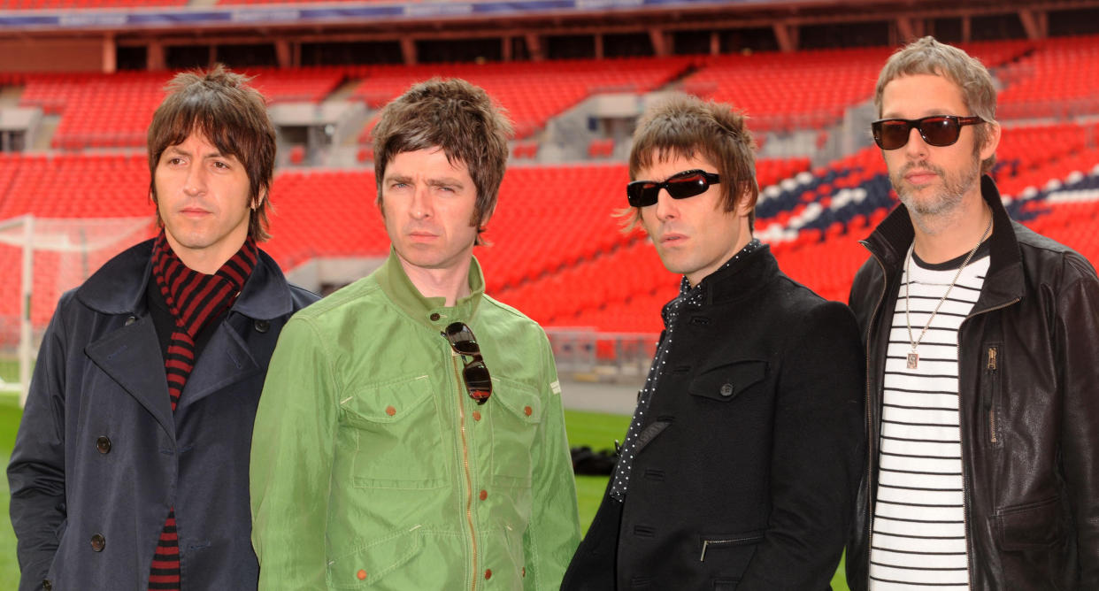 Oasis (from left to right) Gem Archer, Noel Gallagher, Liam Gallagher and Andy Bell are pictured during a photocall at Wembley Stadium, where they announced their biggest ever tour of open air venues in the UK and Ireland next summer.   (Photo by Zak Hussein - PA Images/PA Images via Getty Images)