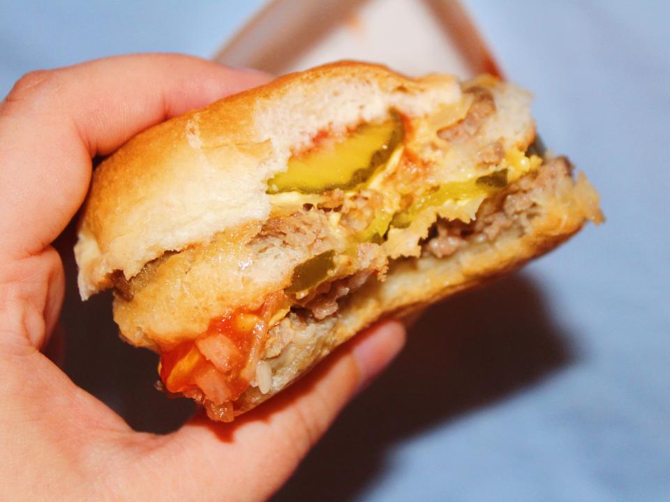 white castle double cheeseburger on blue background