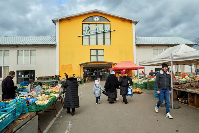 People shop at the market in Mulhouse