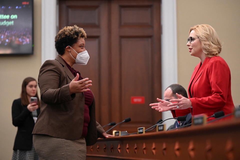 U.S. Office of Management and Budget Director Shalanda Young and U.S. Representative Ashley Hinson (R-IA) speak before a U.S. House Budget Committee hearing on U.S. President Joe Biden&#39;s budget plan for the fiscal year 2023, in Washington, U.S., March 29, 2022. Roberto Schmidt/Pool via REUTERS