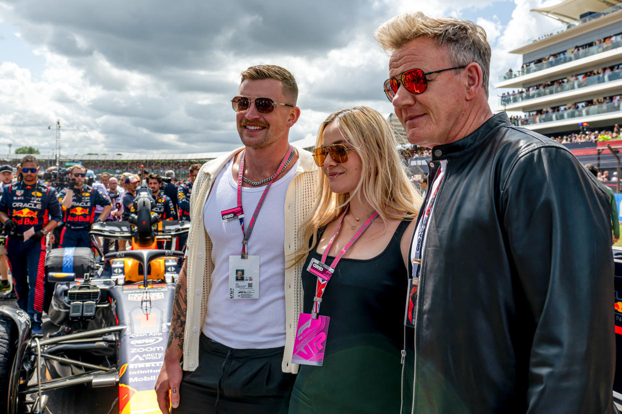 Adam Peaty, Gordon Ramsay and Holly prior to the British Grand Prix at Silverstone Circuit