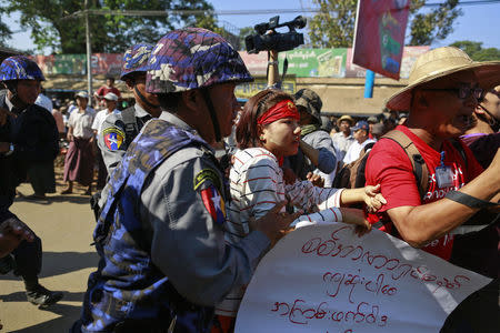 Police detain student Ei Thinzar Maung during a protest against an education bill in Letpadan, Bago division on March 6, 2015. REUTERS/Soe Zeya Tun