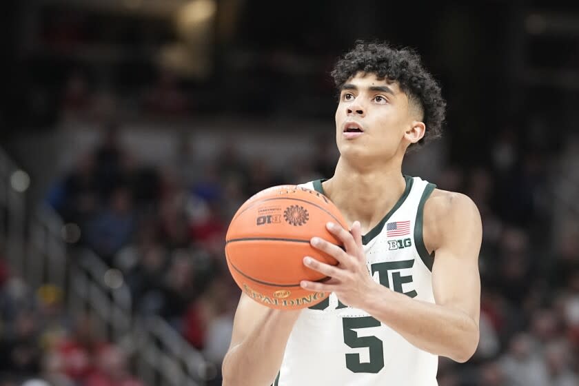 Michigan State's Max Christie shoots during the second half of an NCAA college basketball game against Maryland at the Big Ten Conference tournament, Thursday, March 10, 2022, in Indianapolis. (AP Photo/Darron Cummings)