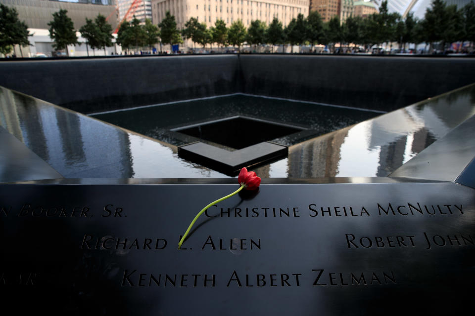 <p>A flower is left at the North pool during a commemoration ceremony for the victims of the September 11 terrorist attacks at the National September 11 Memorial, September 11, 2017 in New York City. In New York City and throughout the United States, the country is marking the 16th anniversary of the September 11 terrorist attacks. (Photo: Drew Angerer/Getty Images) </p>