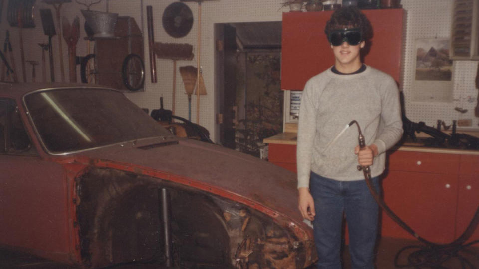 A teenage McKeel Hagerty working on the restoration of a 1967 Porsche 911 S.