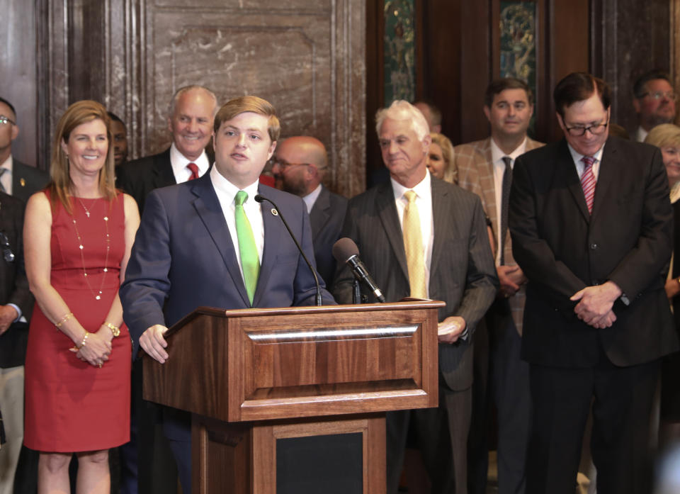 South Carolina Rep. Brandon Newton, R-Lancaster, talks about a new law allowing early voting in the state during a ceremonial signing of an early voting bill on Wednesday, May 18, 2022, in Columbia, S.C. (AP Photo/Jeffrey Collins)