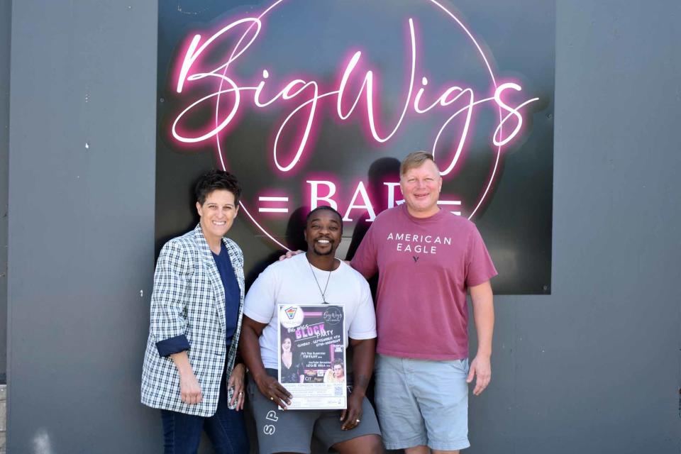 Big Wigs bar and Ames Pride are teaming up for a Labor Day party featuring '80s pop star Tiffany and local YouTube sensation Leslie Hall. Organizers are, left to right, nicci port and Mook Bascomb, both from Ames Pride, and Rusty Brammer, owner of Big Wigs, whose stage name is Vanessa Taylor.