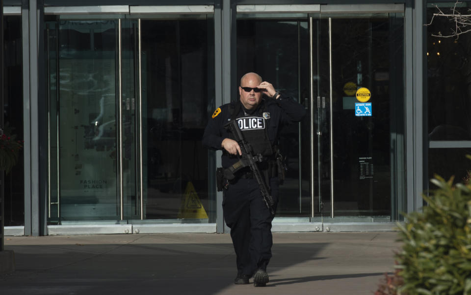 Police clear everyone out of the Fashion Place Mall in Murray, Utah, after a shooting at Sunday, Jan. 13, 2019. (Rick Egan/The Salt Lake Tribune via AP)
