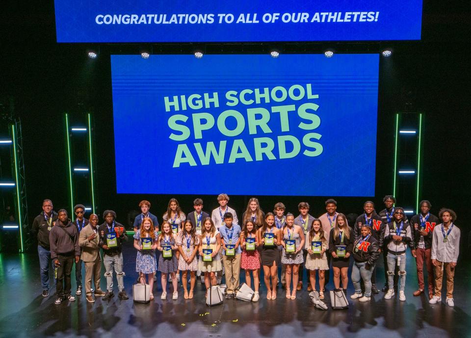 A collection of T&G Hometeam Players of the Year in their respective sports gather on stage at the Hanover Theater on Wednesday night as part of the Central Mass. High School Sports Awards ceremony, presented by DCU-Digital Federal Credit Union.
