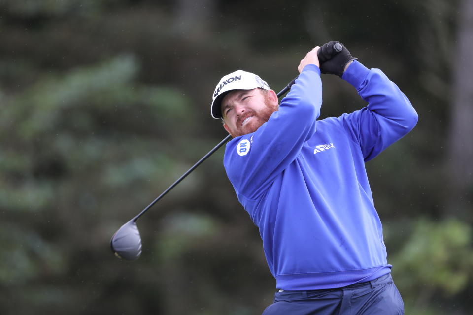 J.B. Holmes of the United States plays tee shot on the 5th hole during the first round of the British Open Golf Championships at Royal Portrush in Northern Ireland, Thursday, July 18, 2019. (AP Photo/Str)