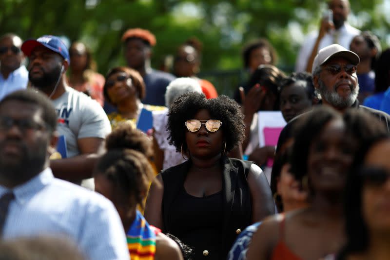 FILE PHOTO: People watch as Actor Chadwick Boseman addresses the 150th commencement ceremony at Howard University in Washington