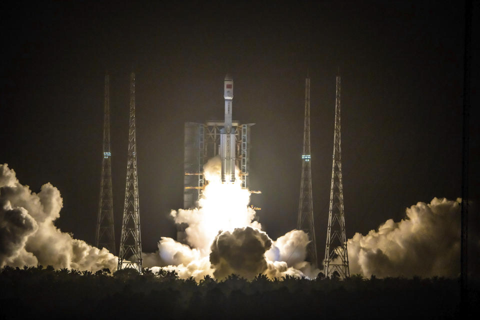 A Long March 7 rocket carrying the Tianzhou-2 spacecraft lifts off from the Wenchang Space Launch Center in Wenchang in southern China's Hainan Province, Saturday, May 29, 2021. A rocket carrying supplies for China's new space station blasted off Saturday from an island in the South China Sea. (Chinatopix via AP)