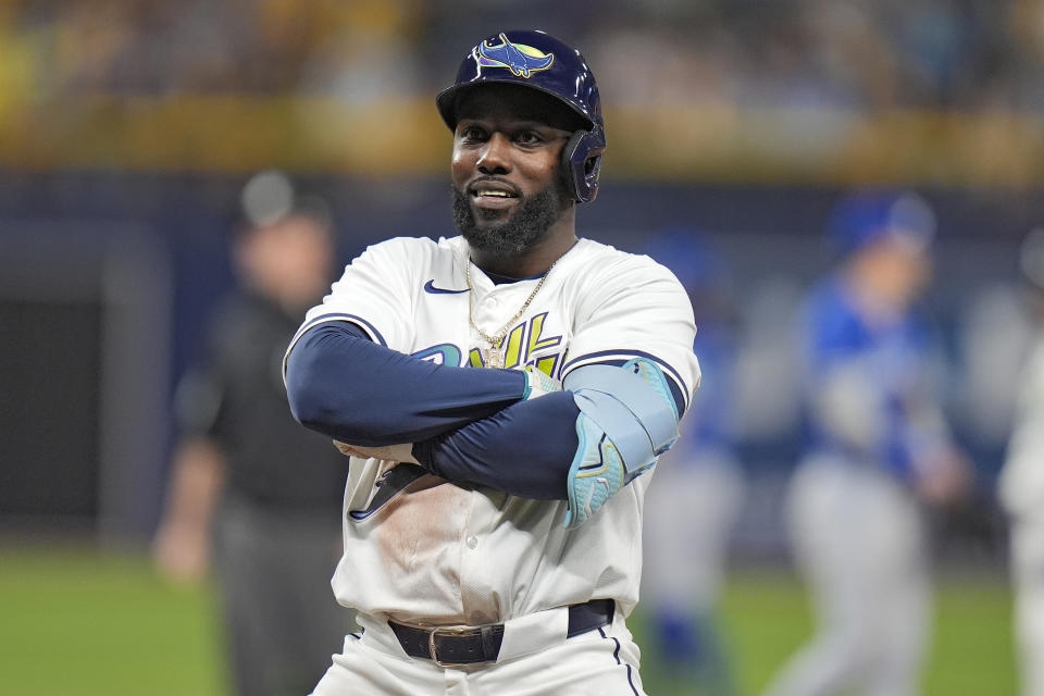 Tampa Bay Rays' Randy Arozarena reacts after his RBI single off Toronto Blue Jays starting pitcher Chris Bassitt scored Yandy Diaz during the fifth inning of a baseball game Friday, March 29, 2024, in St. Petersburg, Fla. (AP Photo/Chris O'Meara)