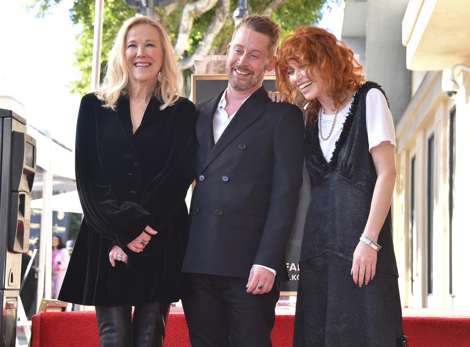 Catherine O'Hara, from left, Macaulay Culkin and Natasha Lyonne attend a ceremony honoring Culkin with a star on the Hollywood Walk of Fame on Friday, Dec. 1, 2023, in Los Angeles. (Photo by Jordan Strauss/Invision/AP)