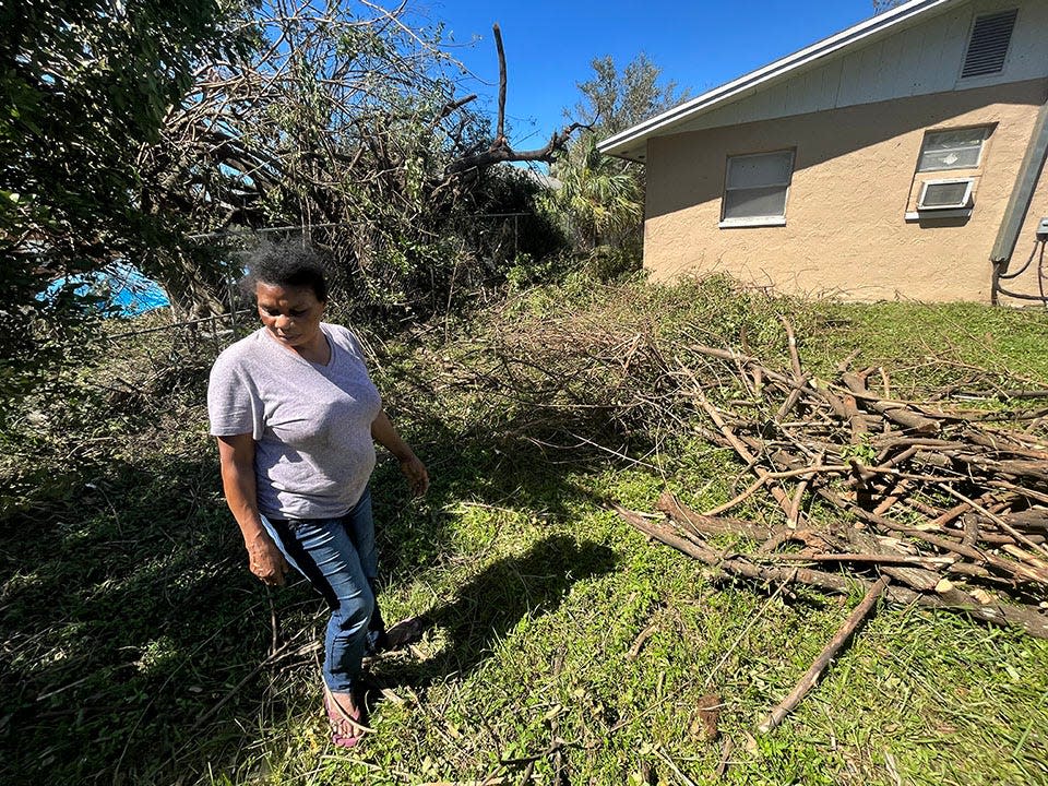 Fort Myers resident Marie Fleurette Radius talks about the damage her community in Fort Myers endured after Hurricane Ian on Sept. 30, 2022.