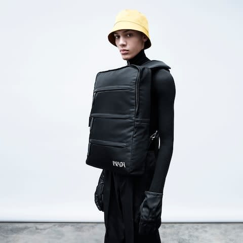 Model wears frontpack, £2,710, Prada Invites, as before - Credit: Willy Vanderperre