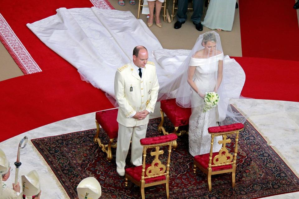 Prince Albert II and Princess Charlene stand at the altar during their religious wedding ceremony
