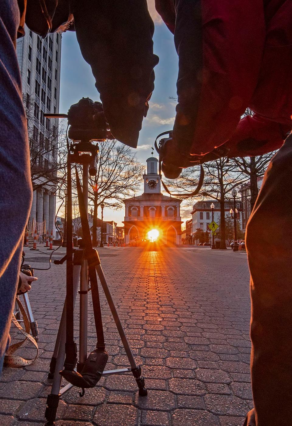 Photographers photograph the Market House sunrise on the morning of Jan. 29, 2020. The next Market House sunrise opportunity is Jan. 29, 2024.