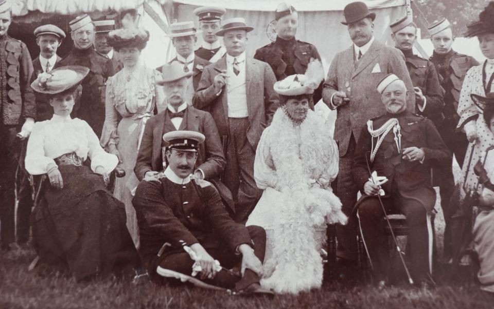 Eva (centre) with Frank Dugdale (seated with military cap) - TMG John Lawrence