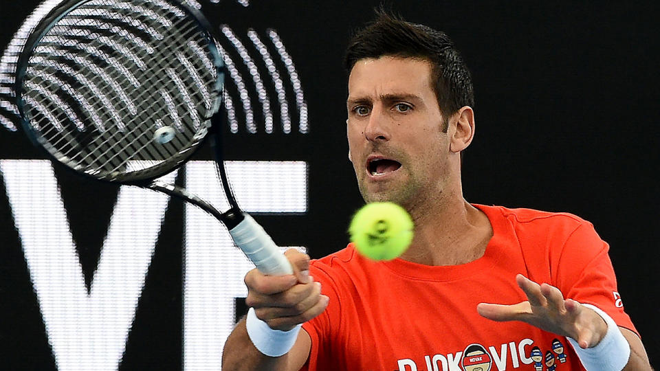 Novak Djokovic caused some confusion by briefly withdrawing from the exhibition series in Adelaide due to blistering on his hand. (Photo by MICHAEL ERREY/AFP via Getty Images)