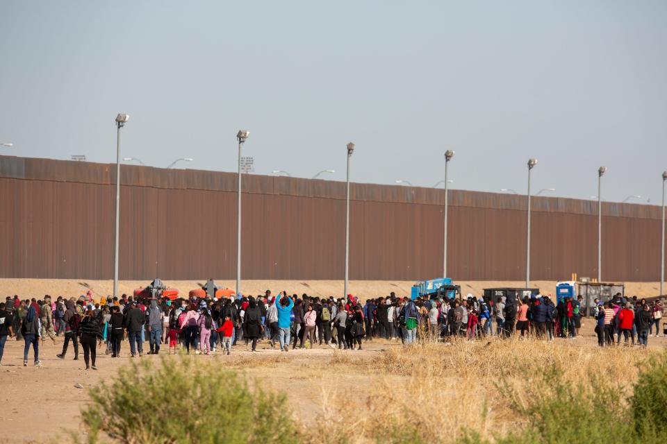 Migrants are detained by U.S. Border Patrol agents after crossing the Rio Grande on March 29, 2023. The migrants had heard false rumors that they would be allowed to seek asylum in the U.S. 