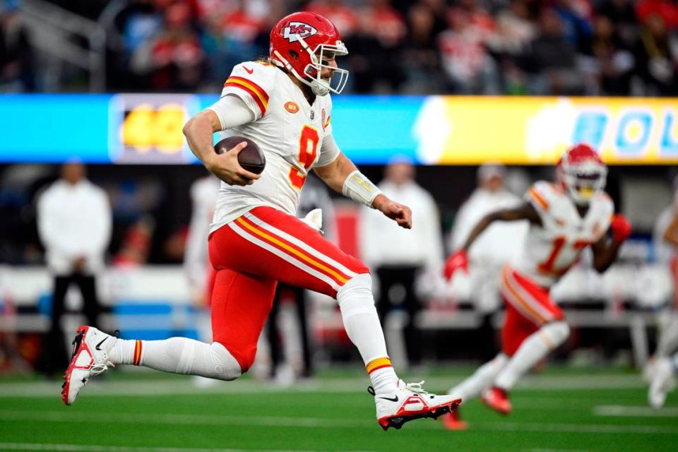 Chiefs quarterback Blaine Gabbert runs for a big gain against the Los Angeles Chargers in the 2023 regular-season finale at SoFi Stadium.