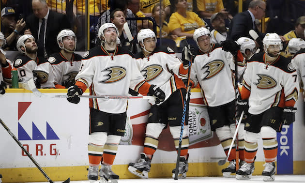 Anaheim Duck players watch a replay during the second period against the Nashville Predators in Game 3 of the Western Conference final in the NHL hockey Stanley Cup playoffs Tuesday, May 16, 2017, in Nashville, Tenn. (AP Photo/Mark Humphrey)