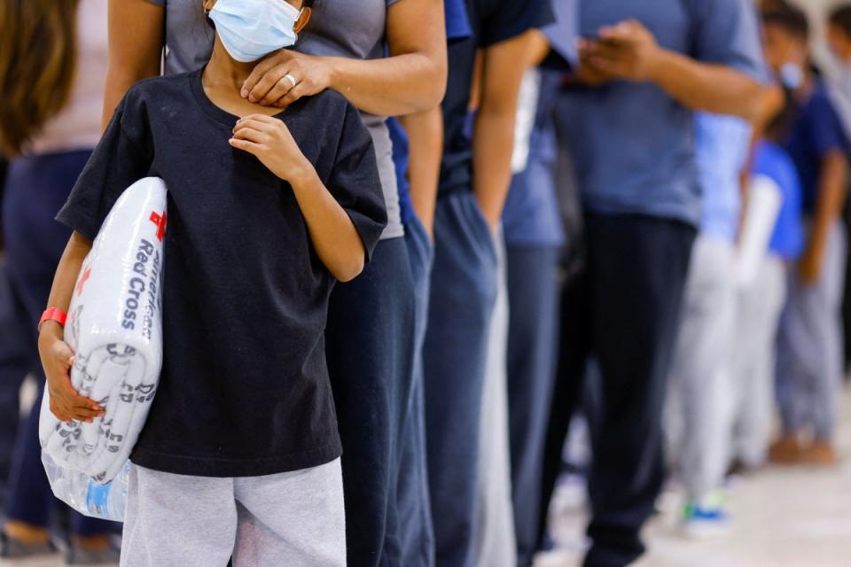 A group of mostly Venezuelan migrants board a bus in El Paso, Texas bound for New York City on 16 September. (REUTERS)