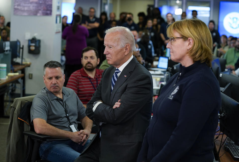 President Joe Biden and FEMA Administrator Deanne Criswell listen during a briefing about Hurricane Ian as they visit FEMA headquarters, Thursday, Sept. 29, 2022, in Washington. (AP Photo/Evan Vucci)